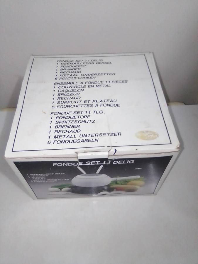 Wow a Elweco boxed complete White enamel Fondue set in almost new condition.