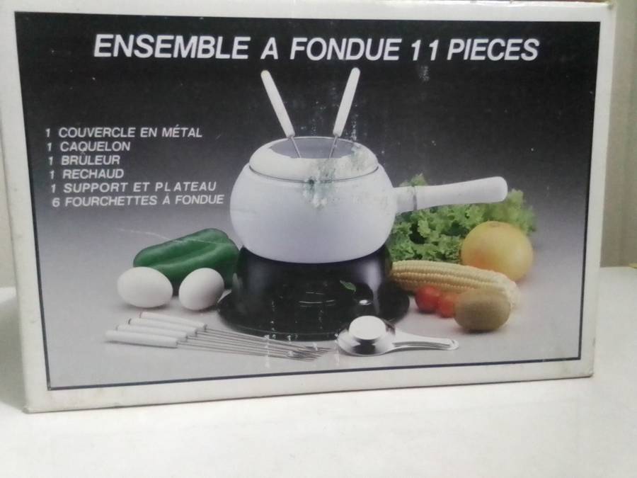 Wow a Elweco boxed complete White enamel Fondue set in almost new condition.