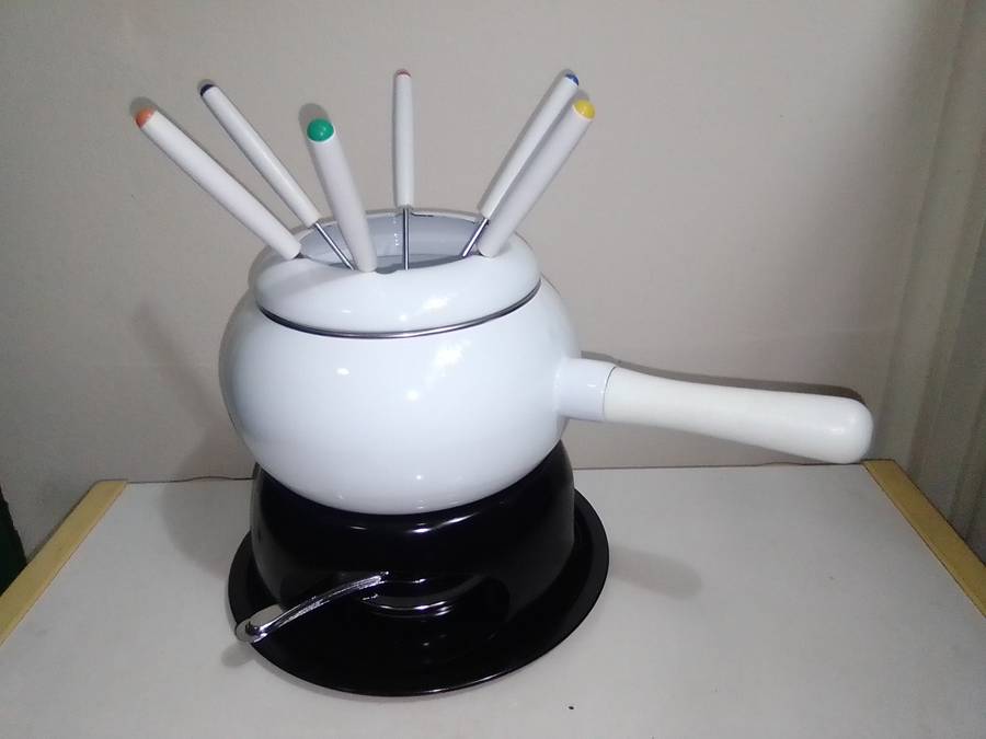 Wow a Elweco boxed complete White enamel Fondue set in almost new condition.