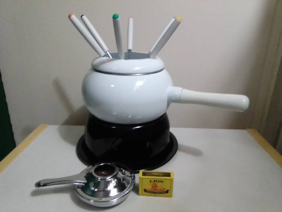 Wow a Elweco boxed complete White enamel Fondue set in almost new condition.