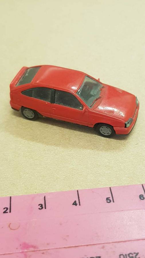 Small model replica of 1986 Opel Kadett Gsi. 45mm as reference.  Made in Germany.  Plastic.