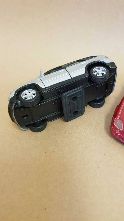 4 Scale model Maisto cars. Renault Clio , Chrysler PT Cruiser ,Mercedes SLK and BMW X5.