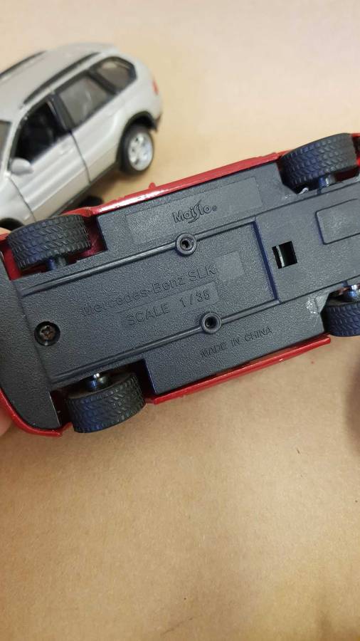 4 Scale model Maisto cars. Renault Clio , Chrysler PT Cruiser ,Mercedes SLK and BMW X5.