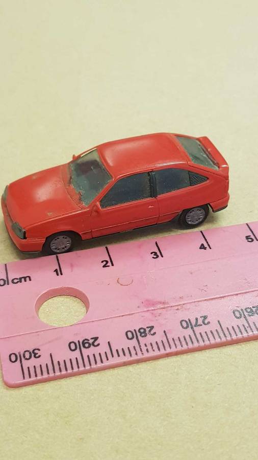 Small model replica of 1986 Opel Kadett Gsi. 45mm as reference.  Made in Germany.  Plastic.