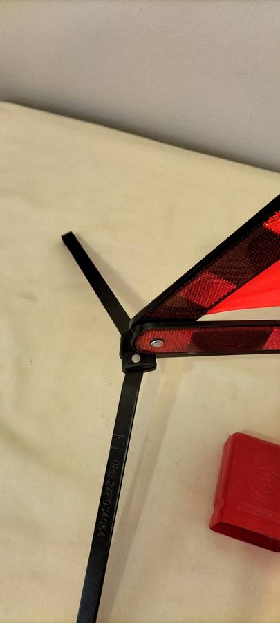A Quality Homologado KL Fold Up Emergency Reflective Triangle with Stand in Holder.