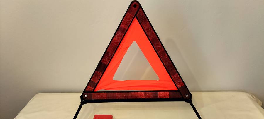A Quality Homologado KL Fold Up Emergency Reflective Triangle with Stand in Holder.