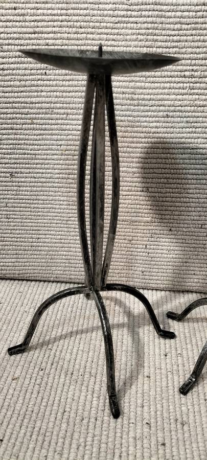 A Superb Pair of Wrought Iron Candle Holders