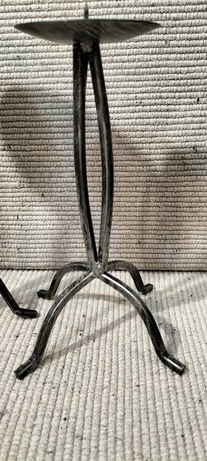 A Superb Pair of Wrought Iron Candle Holders