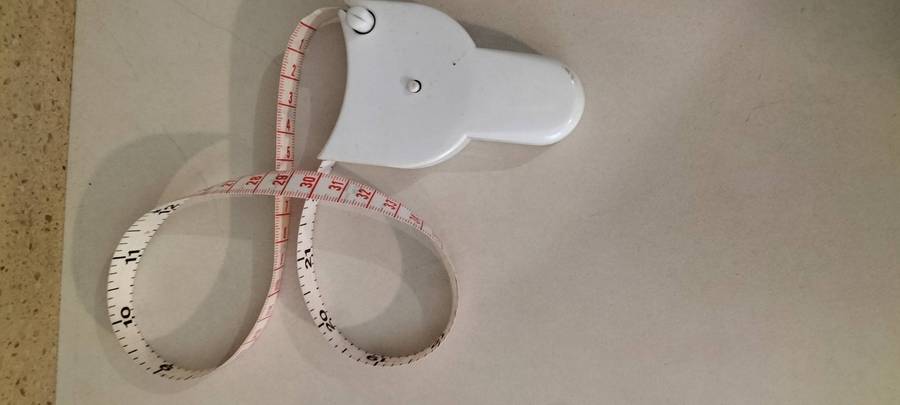 A Working Seamstress (to hang around neck) Tape Measure