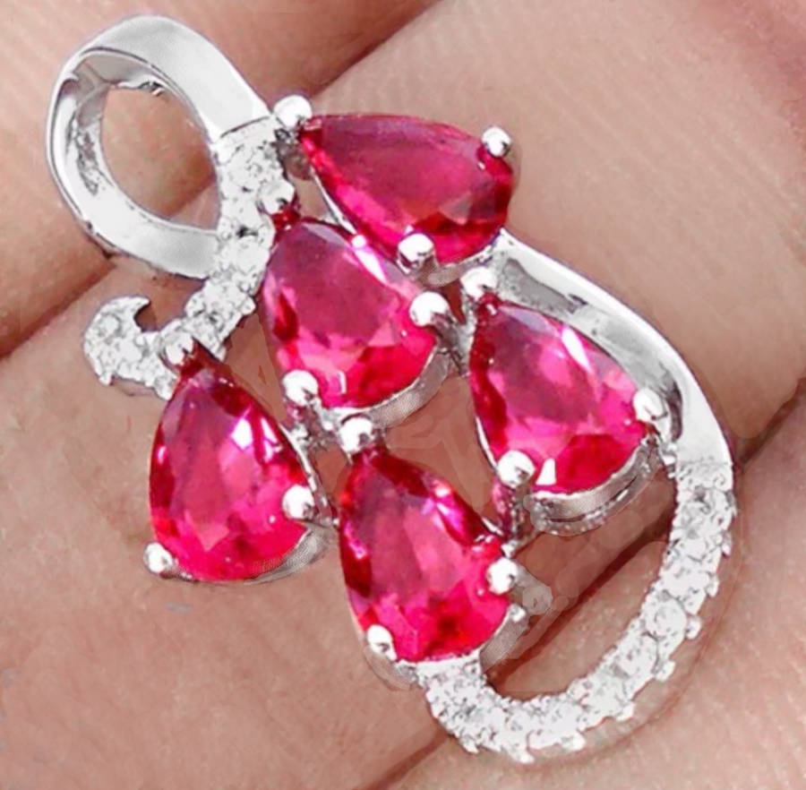 5.62 cts Pink Ruby Pear Shape and White Topaz Gemstones set in Solid .925 Sterling Silver Pendant