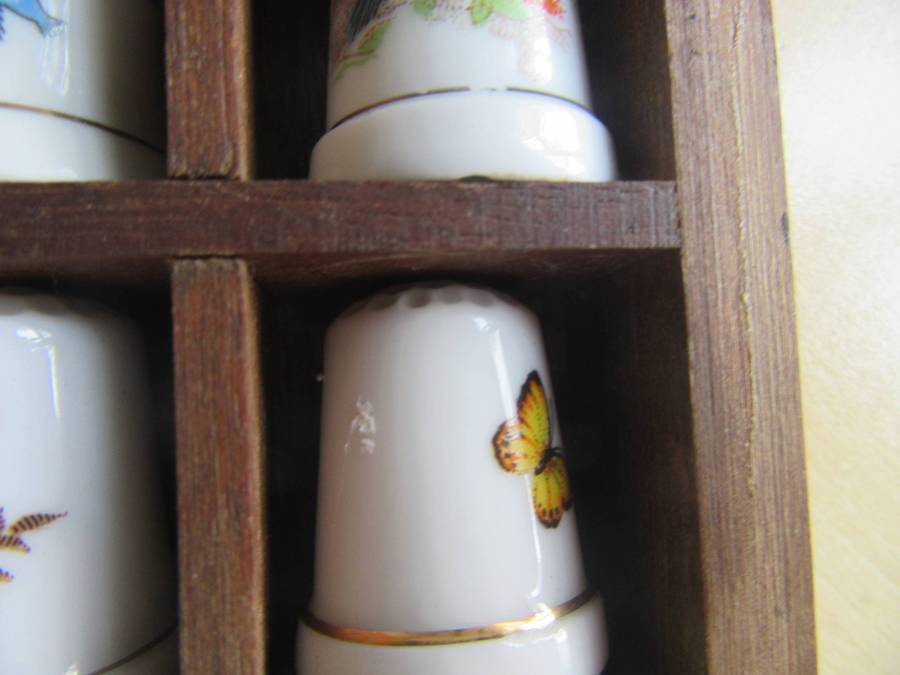 20 BEAUTIFUL PORCELAIN THIMBLESIN SHELF - AS PER SCAN - BID PER ITEM