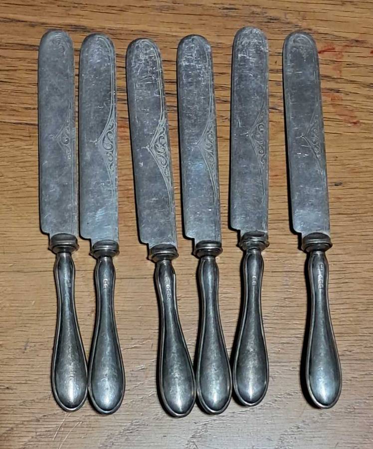 6 silver handled knives