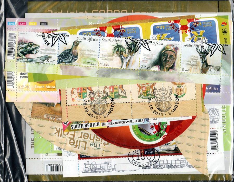 RSA 2010 YEAR PACK (OPENED) WITH CTO STAMPS, SHEETS ETC (STAMPS STILL IN PLASTIC). AS PER SCANS.