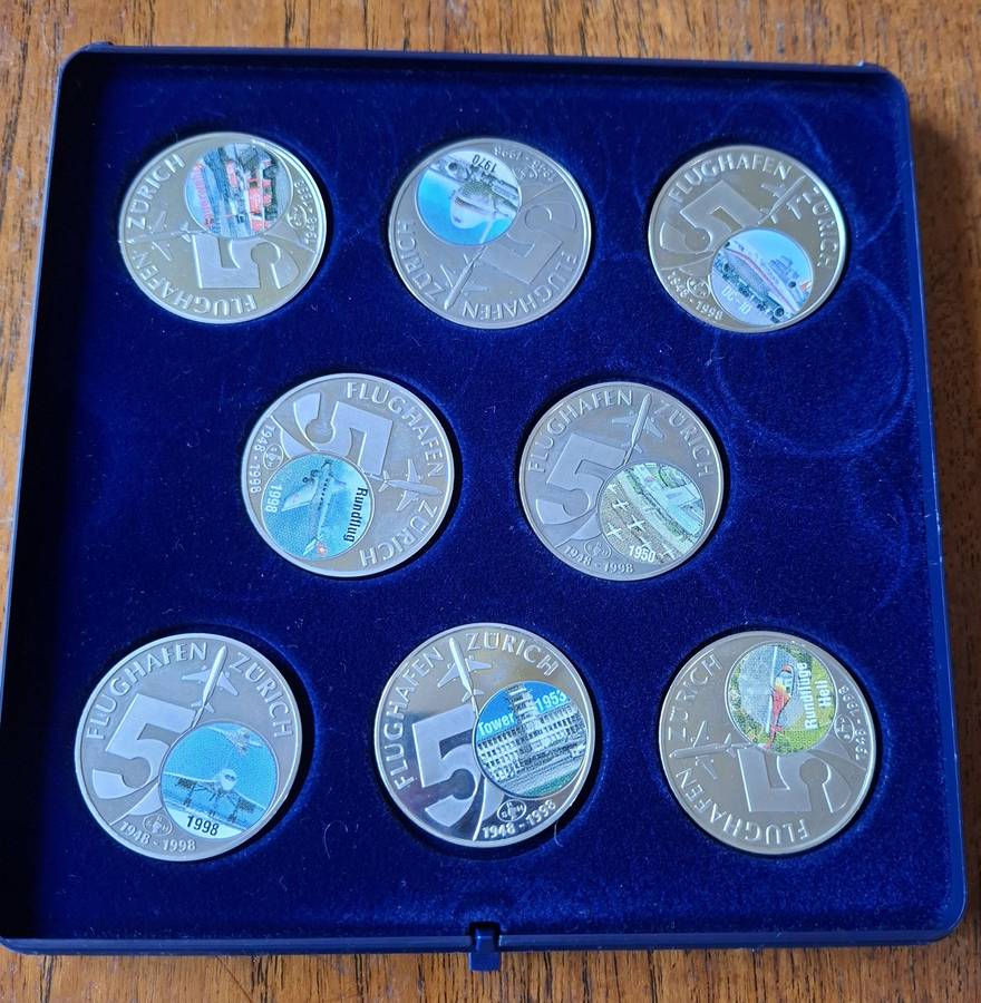 Set of 8 medallions commemorating 50 years of Zurich airport