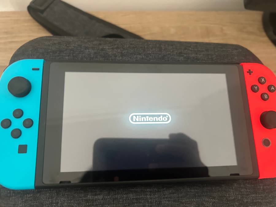 Nintendo Switch V1 with original accessories & Carry bag