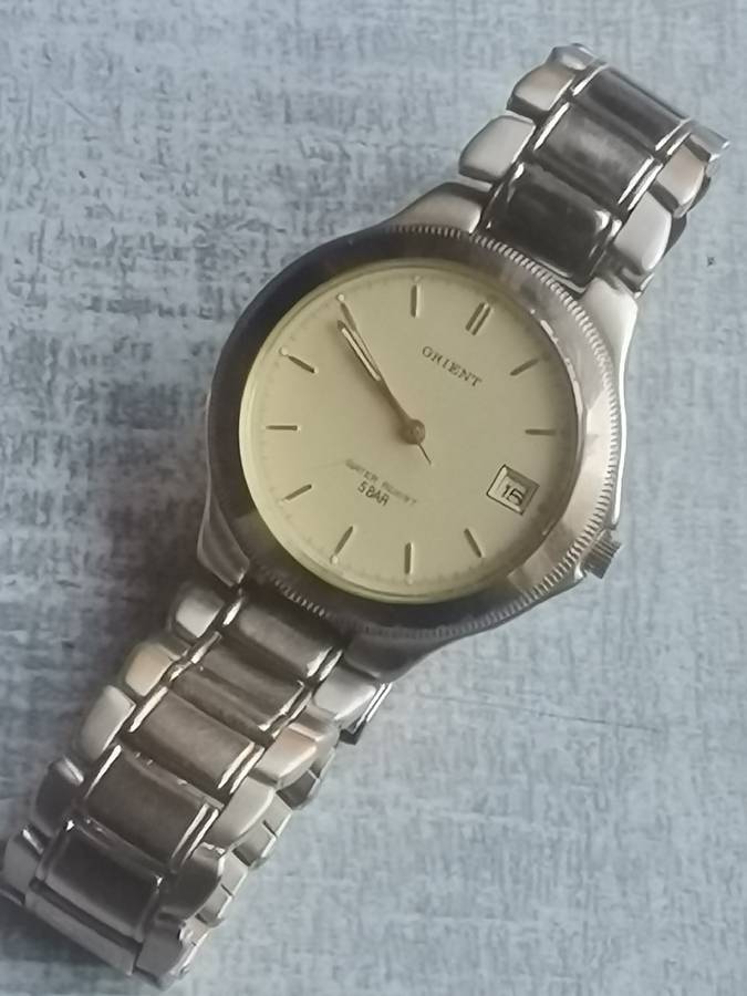 VINTAGE MENS ORIENT GOLD PLATED QUARTZ WATCH IN EXCELLENT WORKING CONDITION