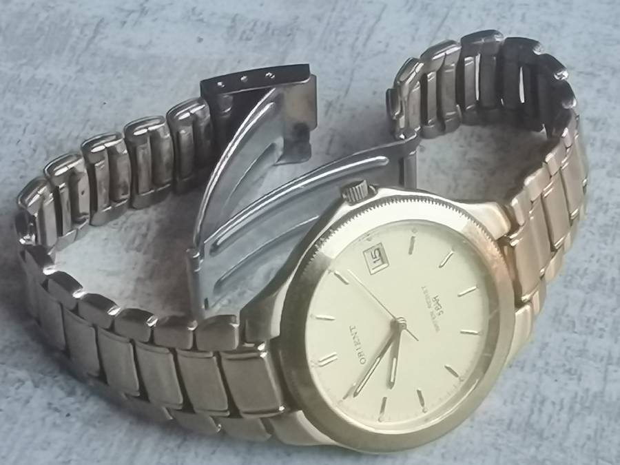 VINTAGE MENS ORIENT GOLD PLATED QUARTZ WATCH IN EXCELLENT WORKING CONDITION