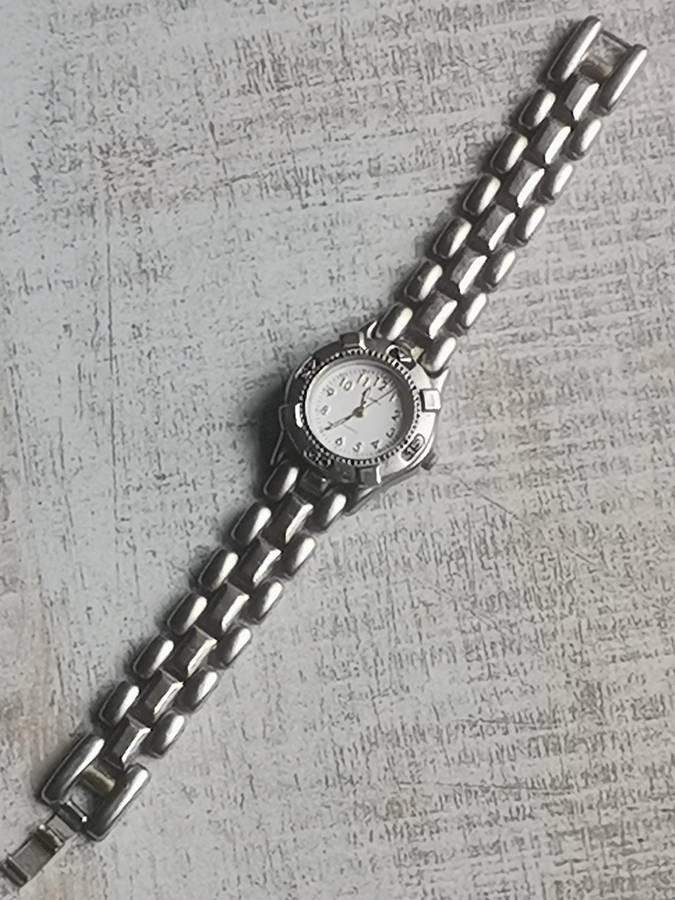 STUNNING AVANT STAINLESS STEEL LADIES WATCH WITH ROTATING BEZEL IN EXCELLENT WORKING CONDITION