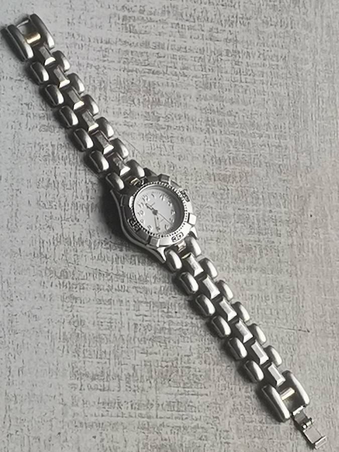 STUNNING AVANT STAINLESS STEEL LADIES WATCH WITH ROTATING BEZEL IN EXCELLENT WORKING CONDITION