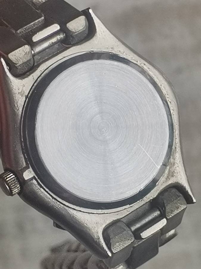 STUNNING AVANT STAINLESS STEEL LADIES WATCH WITH ROTATING BEZEL IN EXCELLENT WORKING CONDITION