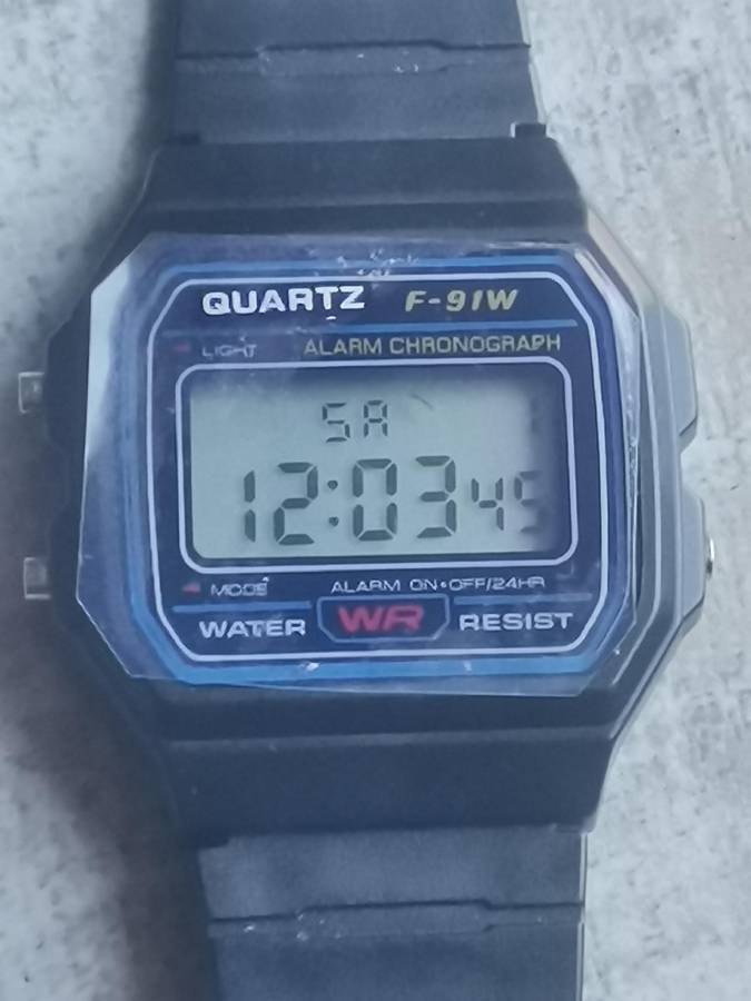 MENS CASIO F-91W DIGITAL ALARM CHRONOGRAPH WATCH IN EXCELLENT WORKING CONDITION - AS NEW