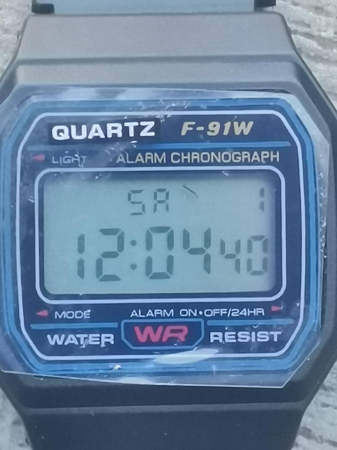 MENS CASIO F-91W DIGITAL ALARM CHRONOGRAPH WATCH IN EXCELLENT WORKING CONDITION - AS NEW