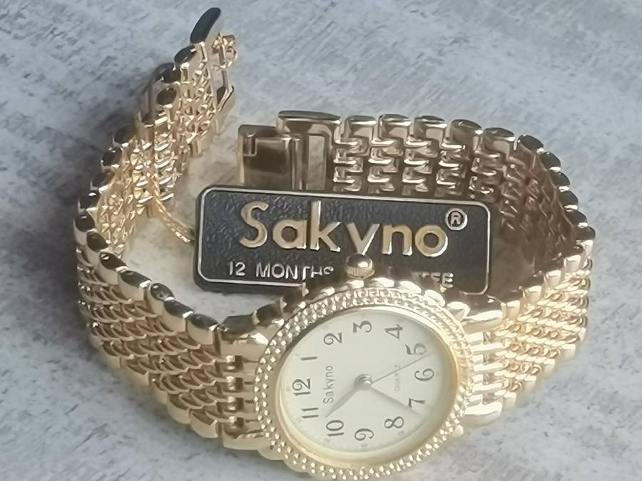 VINTAGE MENS SAKYNO ALL GOLD WATCH IN EXCELLENT WORKING CONDITION - NEW OLD STOCK