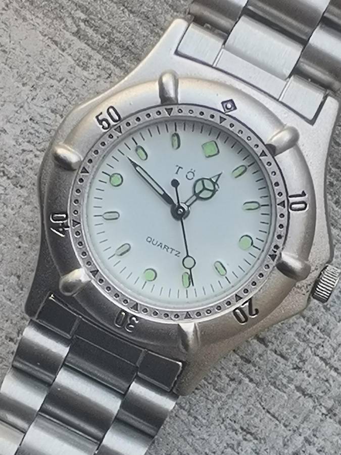 LADIES TORQ STAINLESS STEEL WATCH WITH ROTATING BEZEL IN EXCELLENT WORKING CONDITION