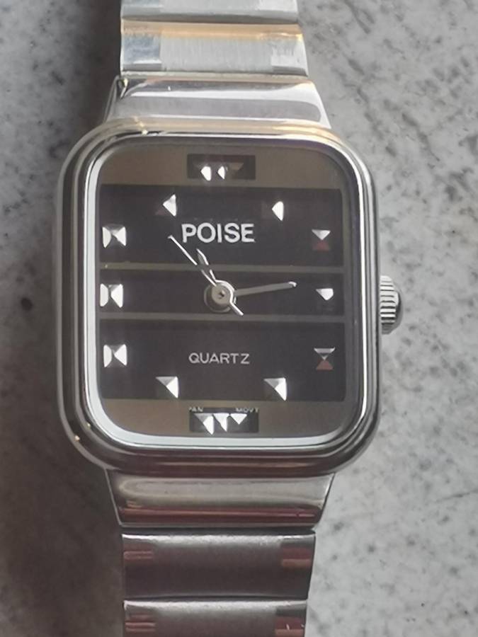 LADIES POISE STAINLESS STEEL WATCH IN EXCELLENT WORKING CONDITION