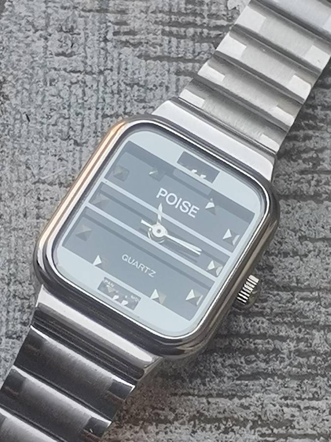 LADIES POISE STAINLESS STEEL WATCH IN EXCELLENT WORKING CONDITION