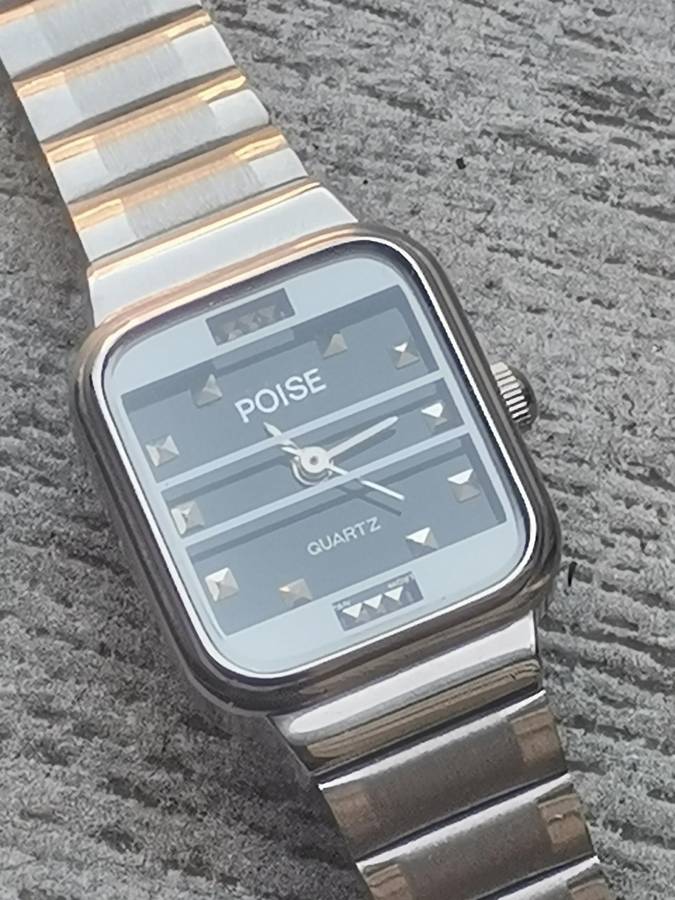 LADIES POISE STAINLESS STEEL WATCH IN EXCELLENT WORKING CONDITION