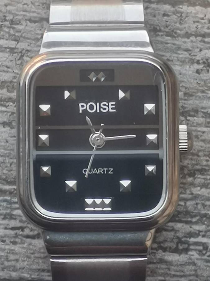 LADIES POISE STAINLESS STEEL WATCH IN EXCELLENT WORKING CONDITION