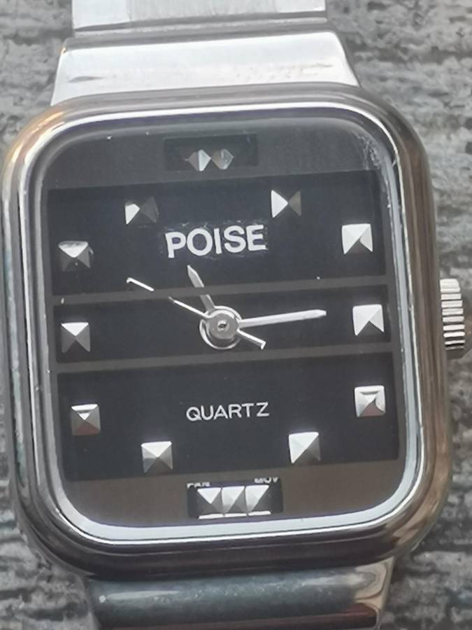 LADIES POISE STAINLESS STEEL WATCH IN EXCELLENT WORKING CONDITION