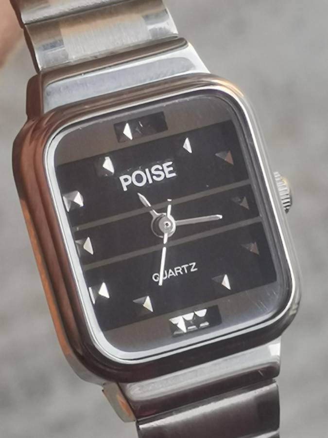 LADIES POISE STAINLESS STEEL WATCH IN EXCELLENT WORKING CONDITION