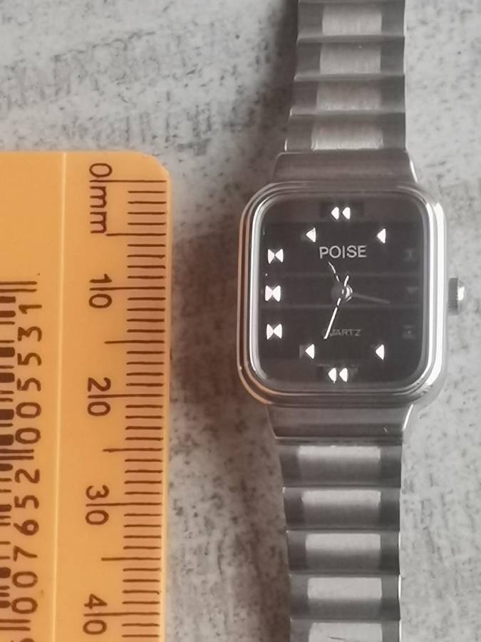 LADIES POISE STAINLESS STEEL WATCH IN EXCELLENT WORKING CONDITION