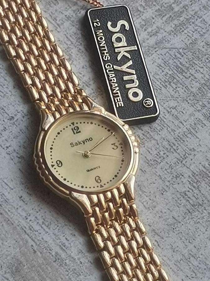 MENS VINTAGE SAKYNO ALL GOLD PLATED WATCH IN EXCELLENT WORKING CONDITION - NEW OLD STOCK