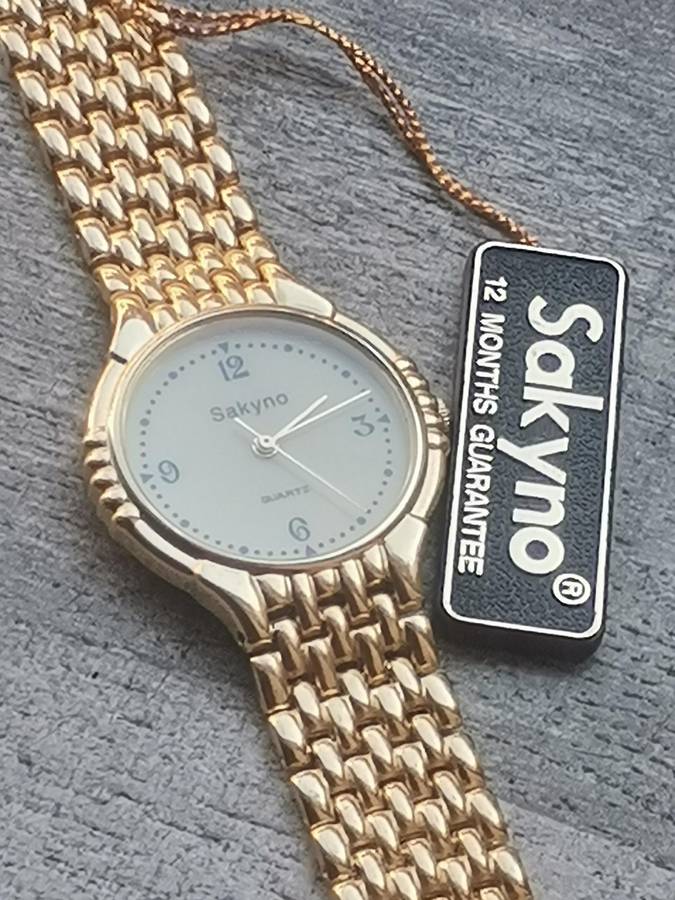MENS VINTAGE SAKYNO ALL GOLD PLATED WATCH IN EXCELLENT WORKING CONDITION - NEW OLD STOCK