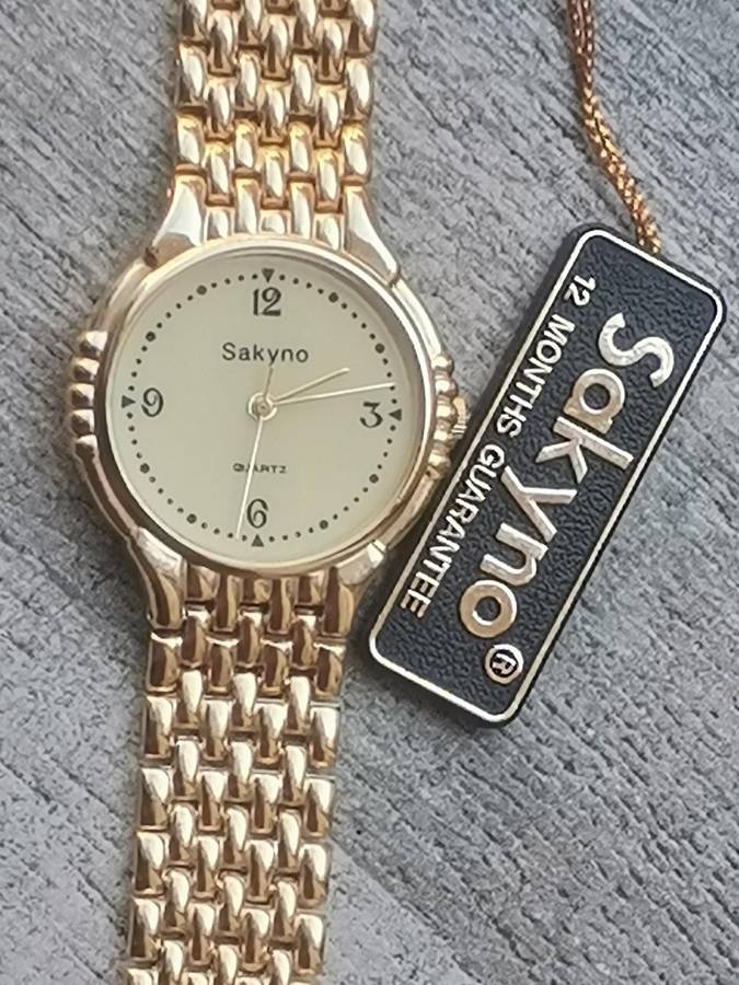MENS VINTAGE SAKYNO ALL GOLD PLATED WATCH IN EXCELLENT WORKING CONDITION - NEW OLD STOCK