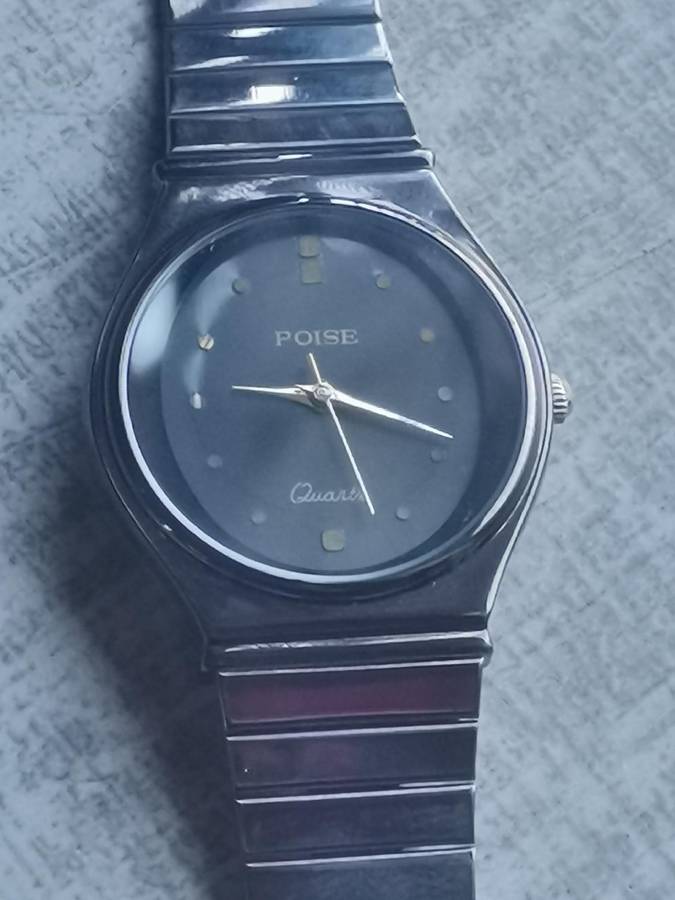 LADIES POISE ALL BLACK STAINLESS STEEL WATCH IN EXCELLENT WORKING CONDITION