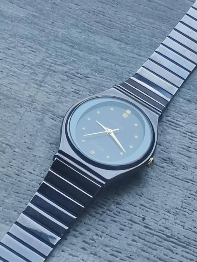 LADIES POISE ALL BLACK STAINLESS STEEL WATCH IN EXCELLENT WORKING CONDITION