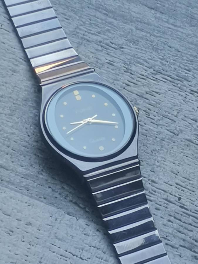 LADIES POISE ALL BLACK STAINLESS STEEL WATCH IN EXCELLENT WORKING CONDITION