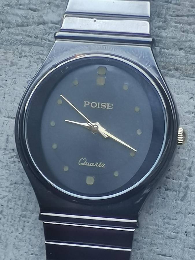 LADIES POISE ALL BLACK STAINLESS STEEL WATCH IN EXCELLENT WORKING CONDITION