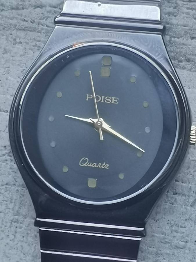 LADIES POISE ALL BLACK STAINLESS STEEL WATCH IN EXCELLENT WORKING CONDITION