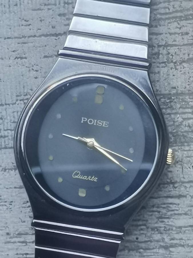 LADIES POISE ALL BLACK STAINLESS STEEL WATCH IN EXCELLENT WORKING CONDITION
