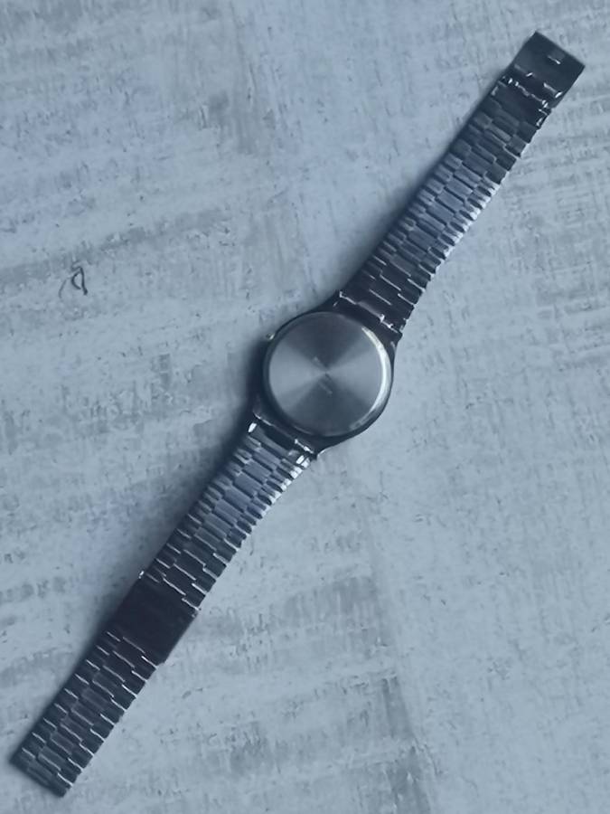 LADIES POISE ALL BLACK STAINLESS STEEL WATCH IN EXCELLENT WORKING CONDITION