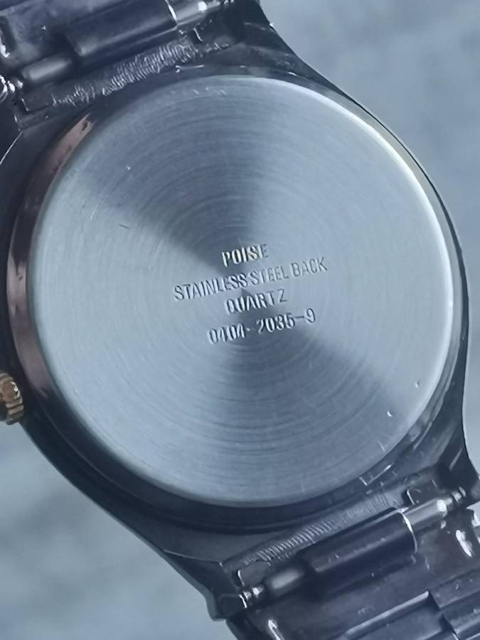 LADIES POISE ALL BLACK STAINLESS STEEL WATCH IN EXCELLENT WORKING CONDITION