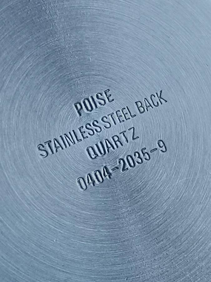 LADIES POISE ALL BLACK STAINLESS STEEL WATCH IN EXCELLENT WORKING CONDITION