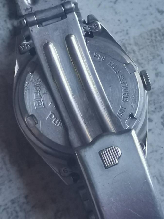 LADIES VINTAGE PULSAR WATCH WITH DAY/DATE FUNCTION IN EXCELLENT WORKING CONDITION