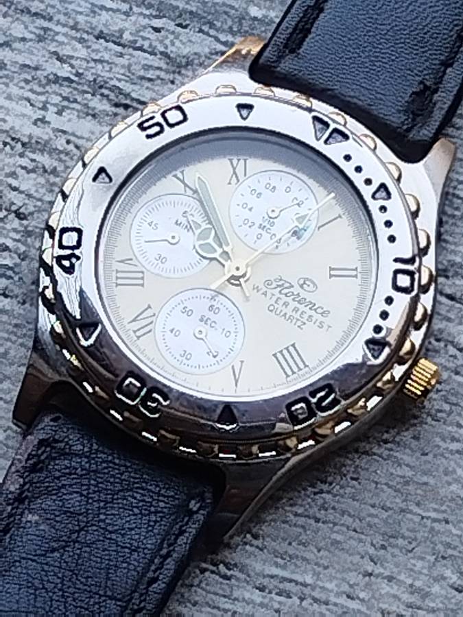 ELEGANT LADIES FLORENCE WATCH WITH ROTATING BEZEL IN EXCELLENT WORKING CONDITION