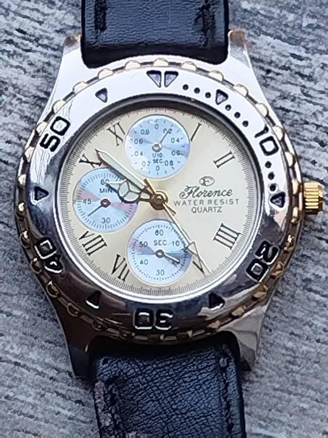 ELEGANT LADIES FLORENCE WATCH WITH ROTATING BEZEL IN EXCELLENT WORKING CONDITION